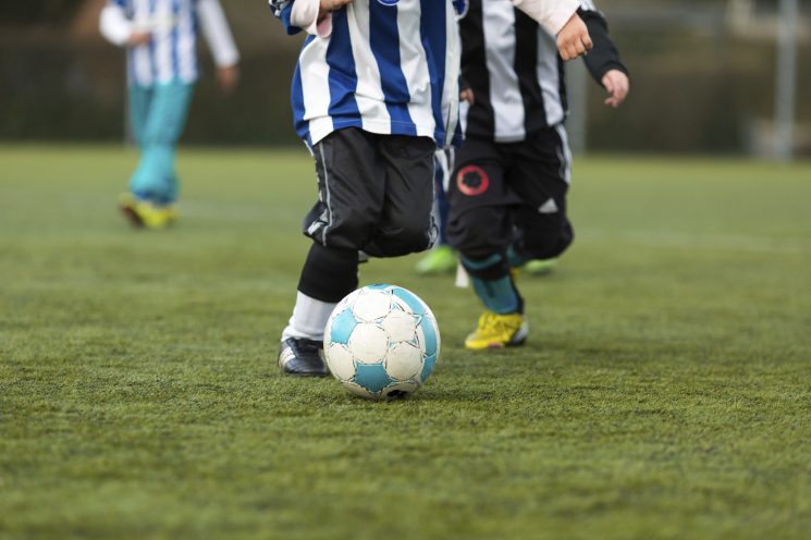 Two young soccer players