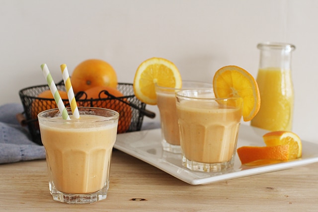 Serve up a fresh glass of vitamin C, protein, and real fruit with this healthy Orange Julius recipe made from simple whole food ingredients. Homemade orange julius in glass