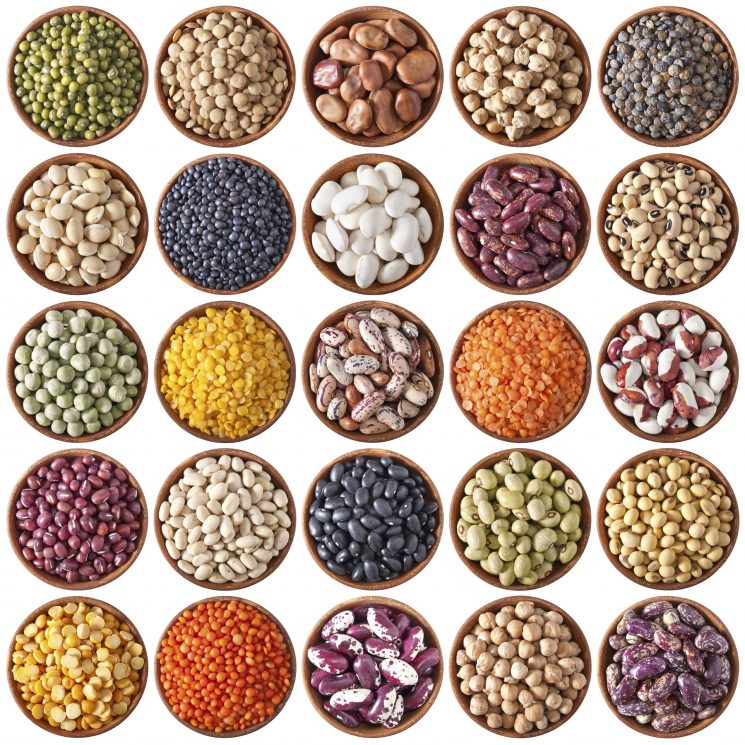 collection of wooden bowls with legumes