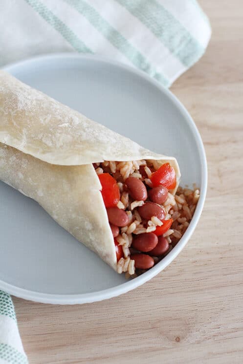 red beans and rice in a wrap on a plate