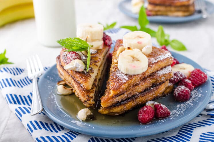 Flax French Toast Triangles with fruit healthy breakfast ideas for kids with raspberries and bananas