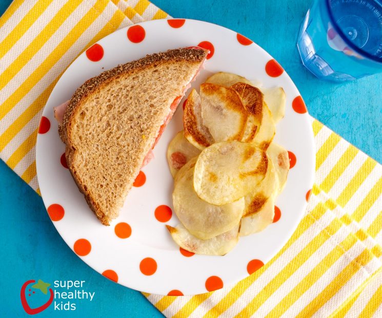 Oven Baked Potato Chips Recipe. Send homemade potato chips to school! Once you get the hang of it, they're a snap!