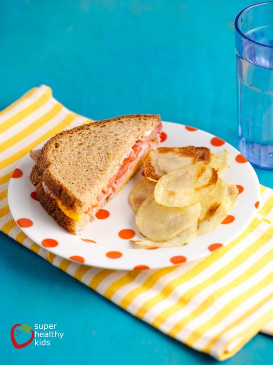 Oven Baked Potato Chips Recipe. Send homemade potato chips to school! Once you get the hang of it, they're a snap!