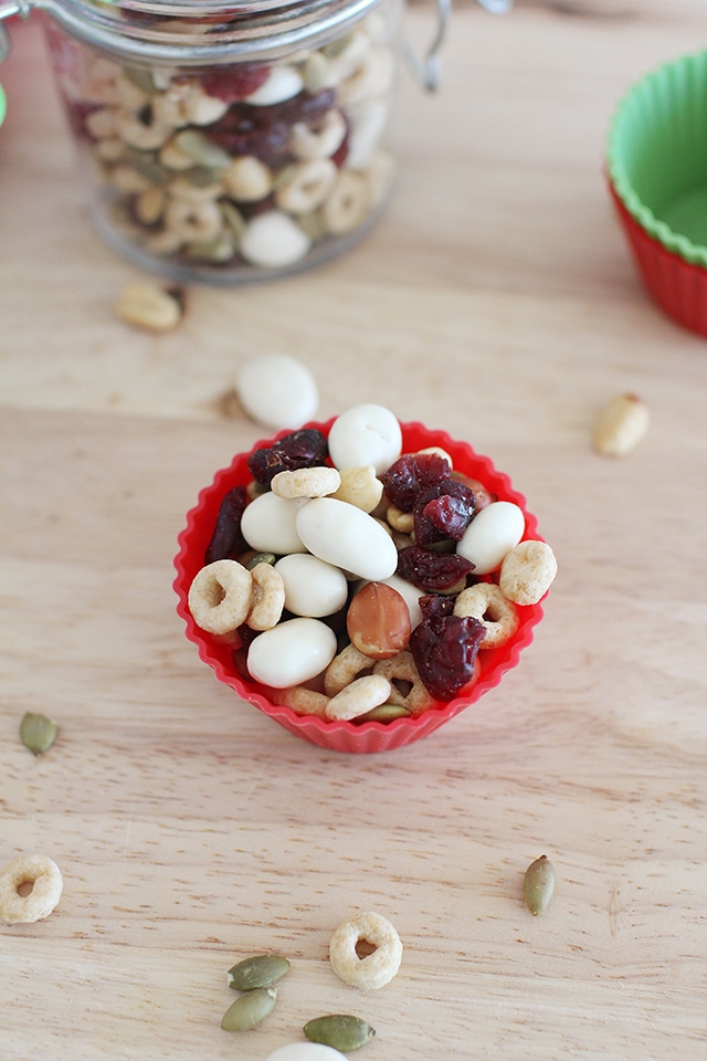Trail mix is a perfect kids snack, no matter what time of year. Just a slight change up with healthy ingredients turns common trail mix, into Christmas Trail mix! Christmas Trail Mix