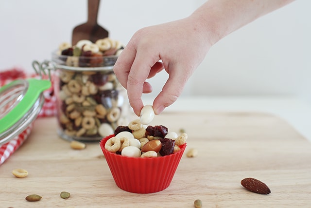 Trail mix is a perfect kids snack, no matter what time of year. Just a slight change up with healthy ingredients turns common trail mix, into Christmas Trail mix! Christmas Trail Mix