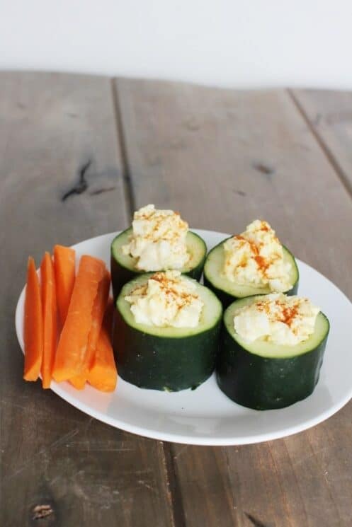 Loaded Cucumber Cups filled with egg salad. Side of carrot sticks.