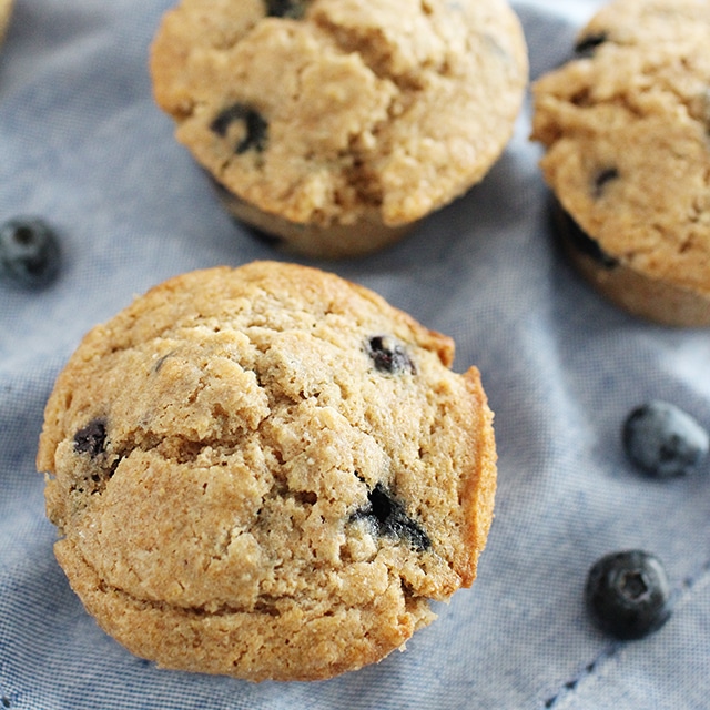 Whole Wheat Blueberry Muffins the way they should be: moist, fruity, and sweetened just-so. Make a double batch and freeze these for a quick breakfast or lunchbox treat. whole wheat blueberry muffins