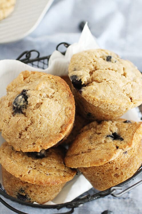 basket of whole wheat blueberry muffins