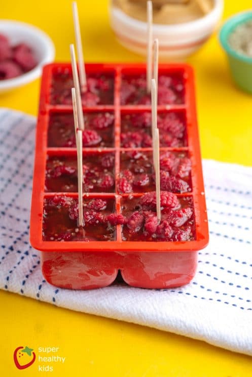 Frozen Peanut Butter Berry Pops. PB & J Popsicles! The tastiest way to enjoy a perfect combination!