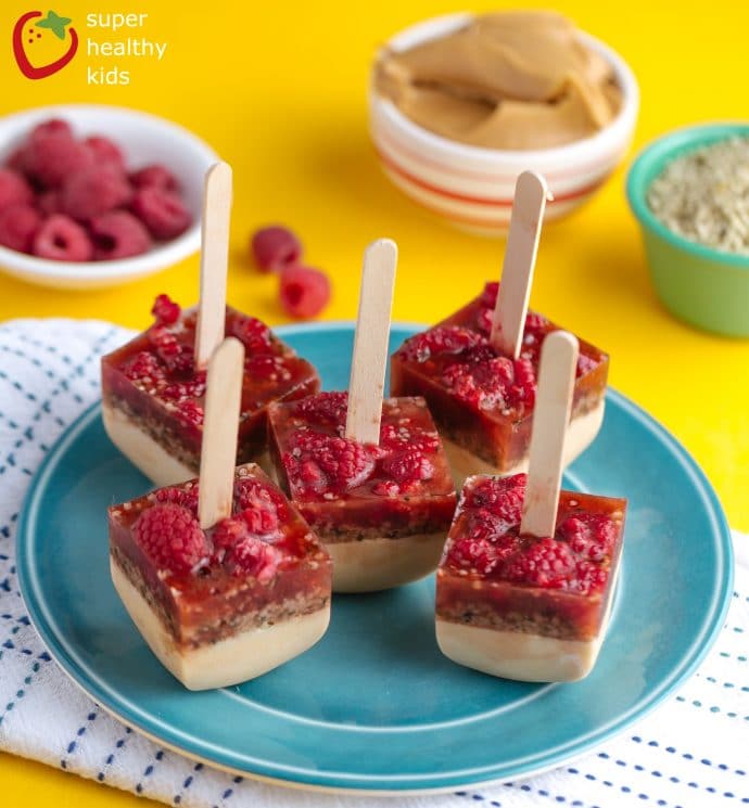 Frozen Peanut Butter Berry Pops. PB & J Popsicles! The tastiest way to enjoy a perfect combination!