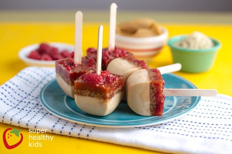 Frozen Peanut Butter Berry Pops. PB & J Popsicles! The tastiest way to enjoy a perfect combination!