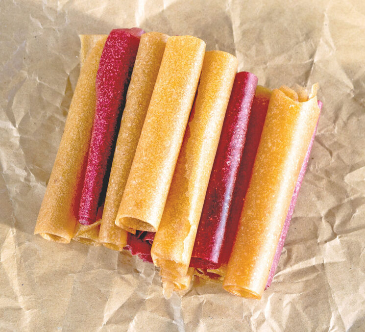 homemade fruit roll-ups on parchment paper aerial view