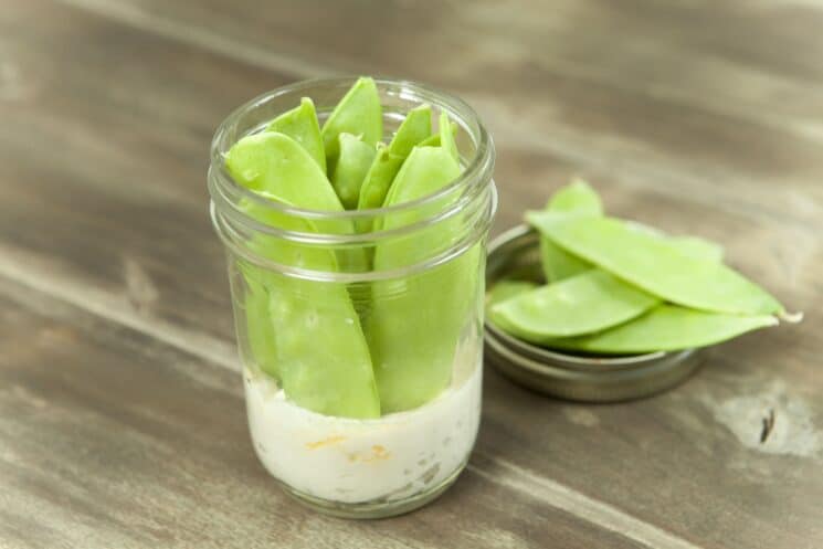 peapods in a jar with dipping sauce