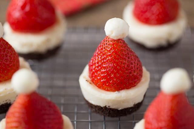 Mini No-Bake Santa Cheesecakes with strawberries