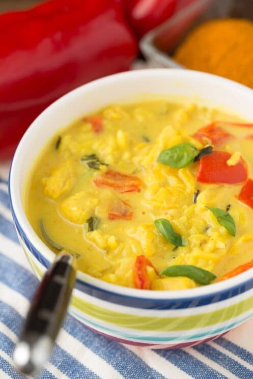 chicken and rice soup in a white bowl