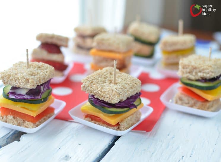 Lunch Box Idea: Mini Rainbow Sandwiches. Lunch box idea using a variety of fruits and veggies for mini sandwiches.