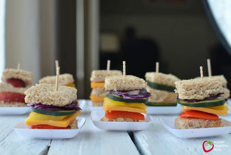 Lunch Box Idea: Mini Rainbow Sandwiches. Lunch box idea using a variety of fruits and veggies for mini sandwiches.