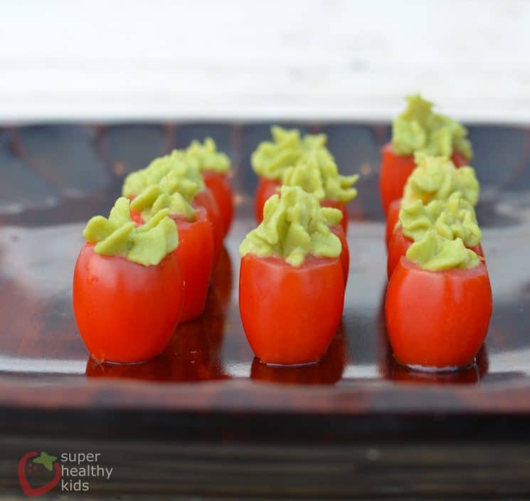 Tomato-Avocado Cup Snacks. Check out this simple snack! Bring them to a party, or just eat them all by yourself!