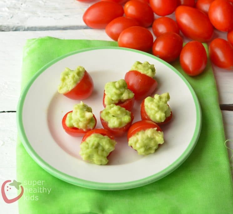 Tomato-Avocado Cup Snacks. Check out this simple snack! Bring them to a party, or just eat them all by yourself!