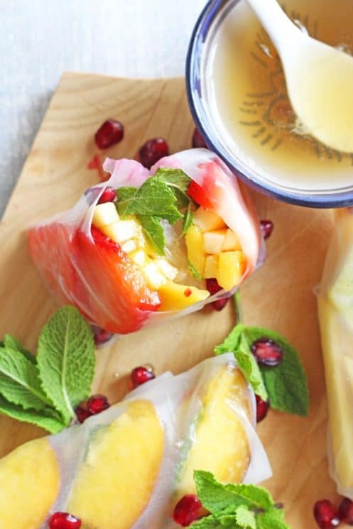 Fresh Fruit Spring Rolls. A delicious and tasty sweet twist on spring rolls, filled with fresh fruit and served with a honey lime dip. www.superhealthykids.com