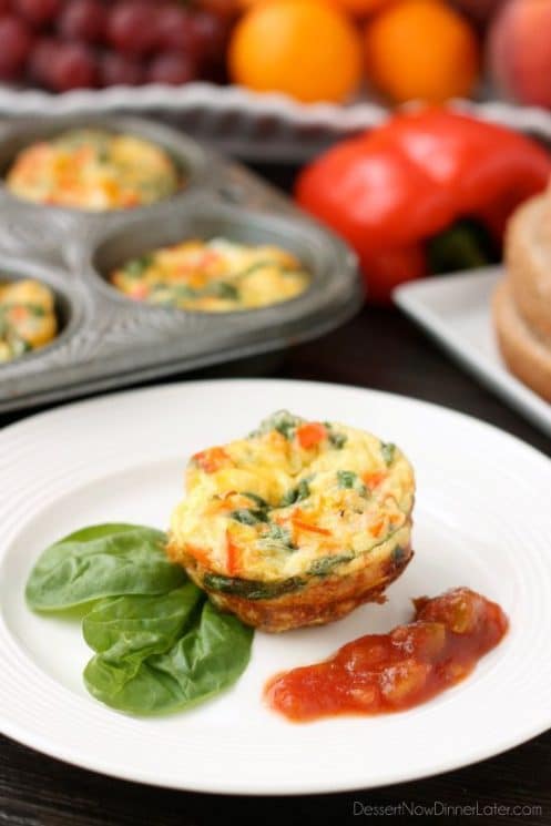 Breakfast Egg Cups 1 These Breakfast Egg Cups are the perfect breakfast on-the-go. Make them ahead of time, refrigerate or freeze them, and then heat them in the microwave when you are ready to eat!