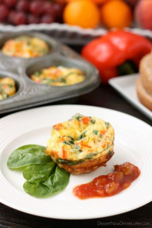 These Breakfast Egg Cups are the perfect breakfast on-the-go. Make them ahead of time, refrigerate or freeze them, and then heat them in the microwave when you are ready to eat!