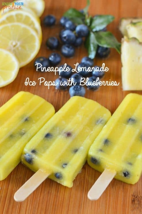 Pineapple Lemonade Ice Pops with Blueberries. Super refreshing with an amazing flavor! www.superhealthykids.com