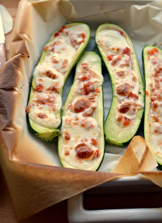 Simple Zucchini Boats with Tomatoes and Fresh Mozzarella. LOVE this summer side dish. www.superhealthykids.com