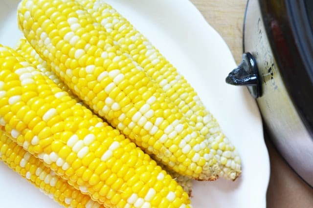 Slow Cooker Corn on the Cob. Game changer - sweet perfectly cooked corn with no effort at all! www.superhealthykids.com