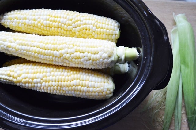 Slow Cooker Corn on the Cob. Game changer - sweet perfectly cooked corn with no effort at all! www.superhealthykids.com