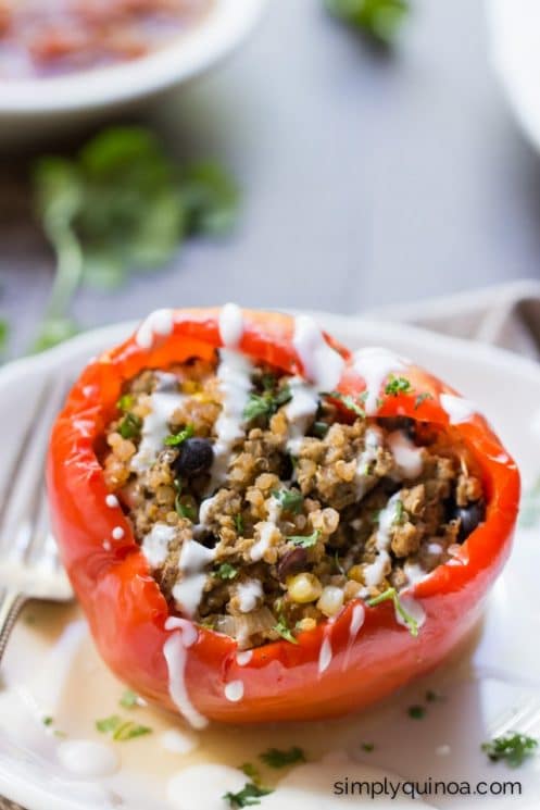 Crockpot Stuffed Peppers - made with Mexican quinoa, ground beef and cheddar cheese!