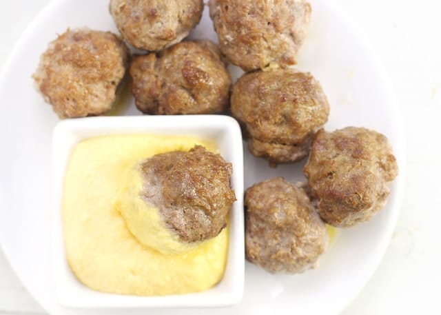 Rosemary Squash Meatballs - Simple baked meatballs with squash added for nutrition, and as a gluten free filler. Served with a squash puree for dipping, to double up on the squash goodness.