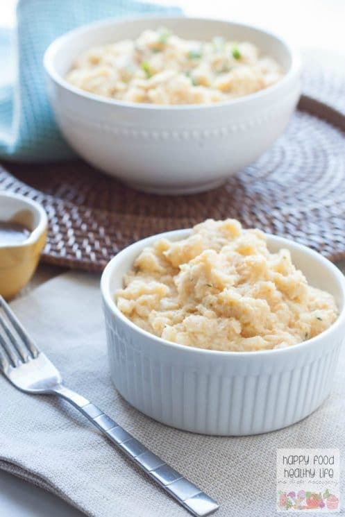 Garlic & Herb Mashed Cauliflower. A health-conscious side dish that is so delicious you won't even me missing the potatoes! In fact, you may not even realize they aren't potatoes!