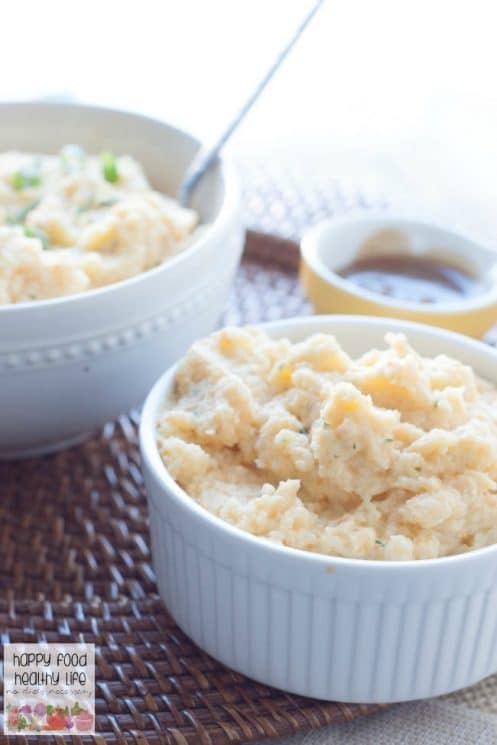 Garlic & Herb Mashed Cauliflower. A health-conscious side dish that is so delicious you won't even be missing the potatoes! In fact, you may not even realize they aren't potatoes!