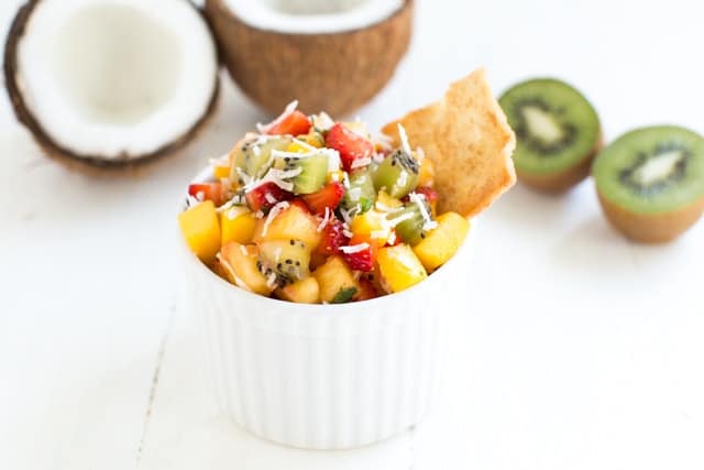 Easy Tropical Fruit Salsa made with fresh mango, pineapple, kiwi, strawberries and unsweetened coconut! www.superhealthykids.com