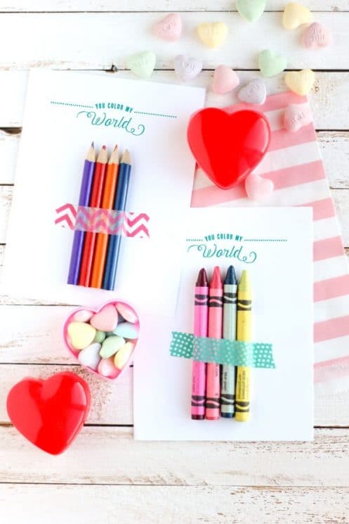 valentines with crayons taped on them