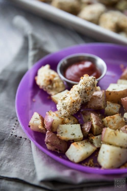 RANCH CRUSTED CHICKEN NUGGETS AND ROASTED POTATOES | This one pan meal is sure to please kids and adults alike. Make with only a few simple ingredients, these are chicken nuggets you can feel good about feeing your children!