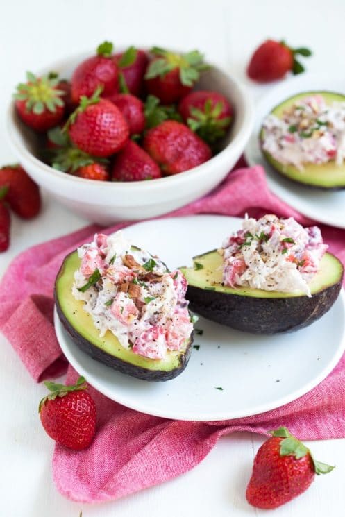 Strawberry Pecan Chicken Salad is made with fresh strawberries, pecans, and Greek yogurt! Serve the salad is fresh avocado bowls.