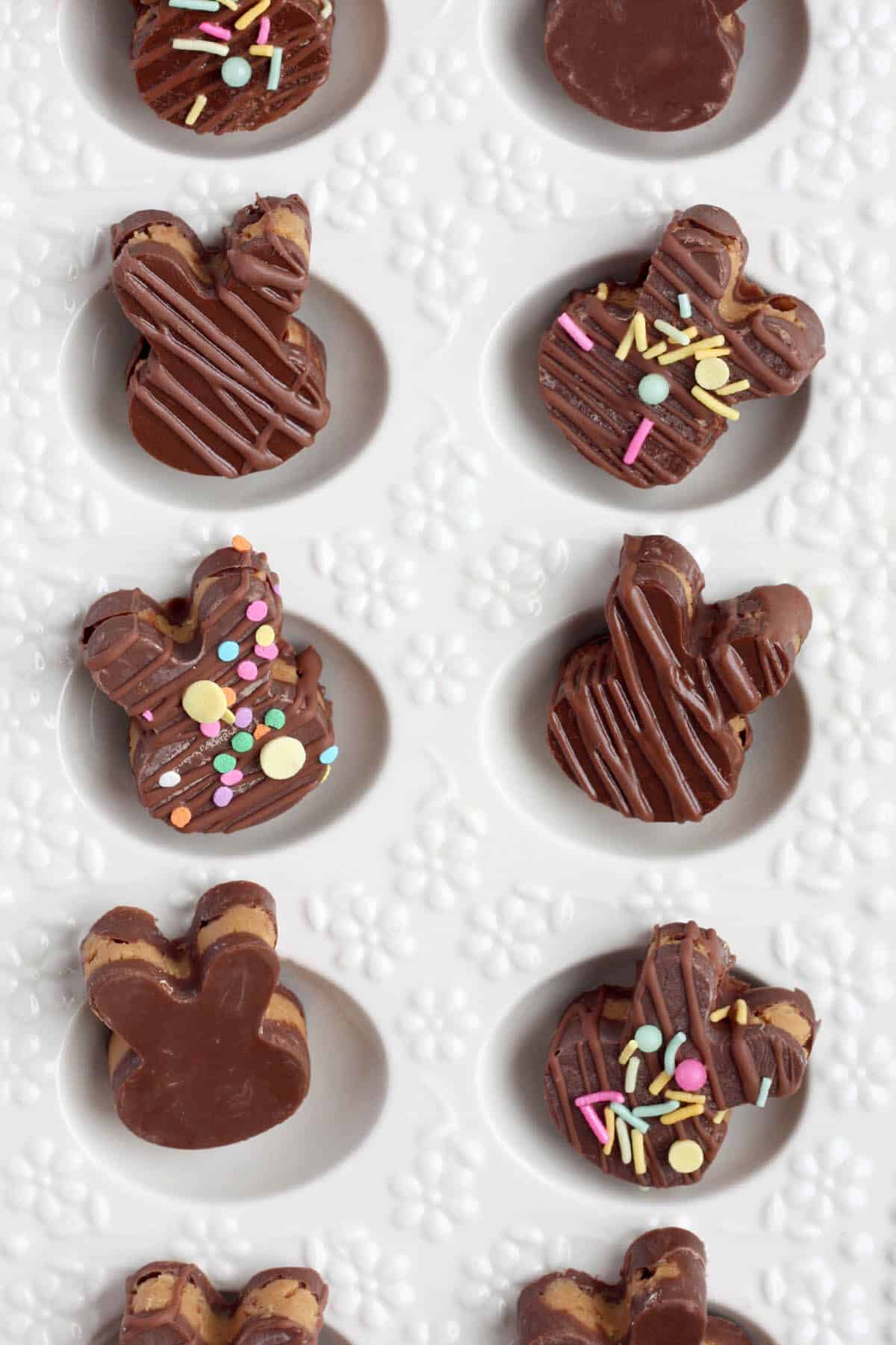 Bunnies in peanut butter cup in white egg tray