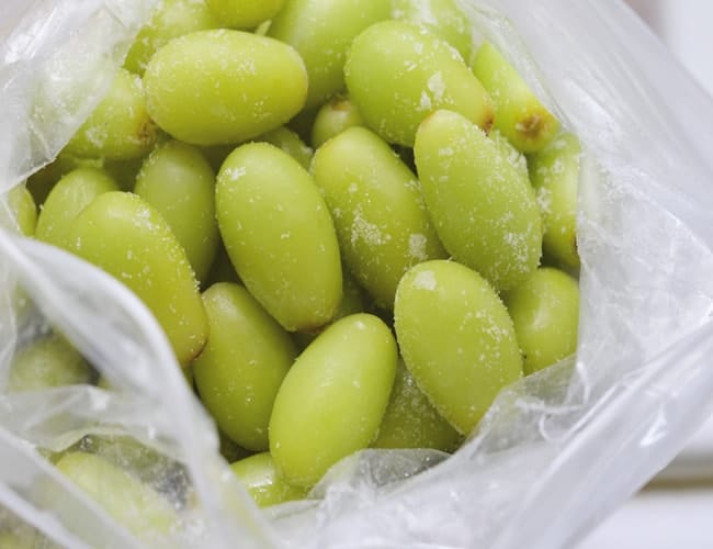 frozen green grapes in a bag