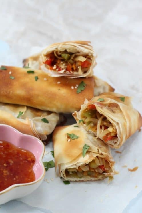 Delicious veggie packed spring rolls, crunchy on the outside and packed with amazing flavor on the inside! www.superhealthykids.com