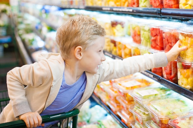 How to Help Your Children Try New Foods. Lots of great ideas here! kids picking out fruit in the store