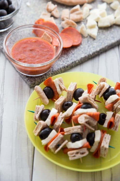 PIZZA KEBABS the easiest snack you're kids are sure to love! Not only are they quick, but they are so simple to put together the kids can make them almost all on their own (with help in the baking of course). Perfect for an after school pick-me-up!