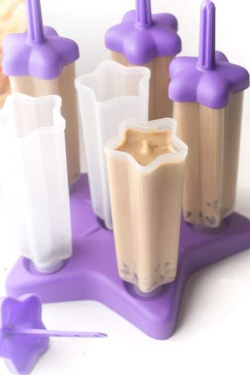 Peanut Butter Banana Yogurt Popsicles are a healthy way to cool down this summer! Rich, creamy and the perfect healthy treat for your sweet tooth! www.superhealthykids.com