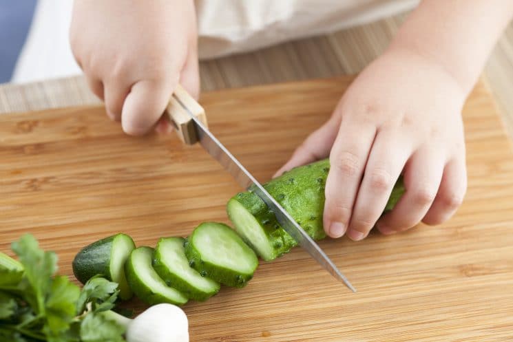 When should your child start using a knife in the kitchen?