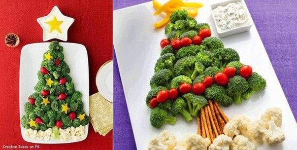 broccoli and tomatoes in the shape of a Christmas tree on a white serving platter