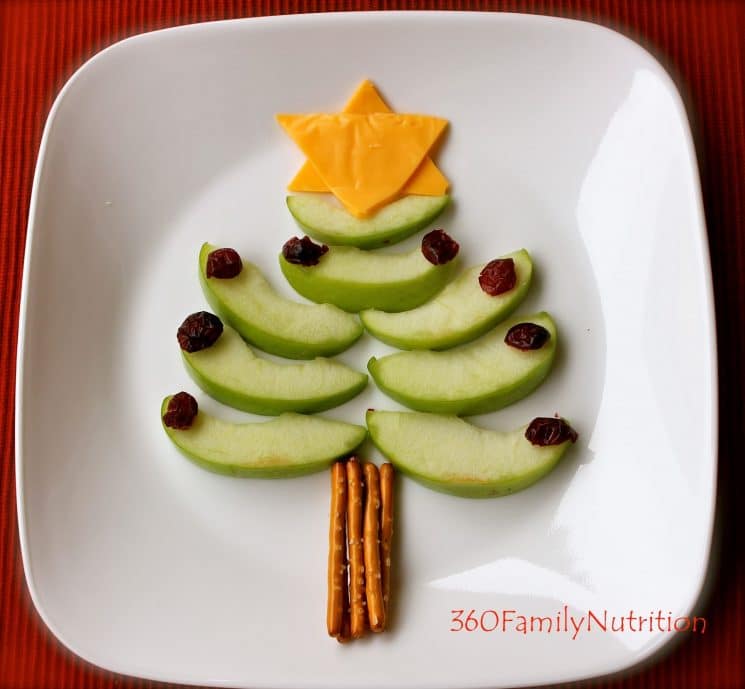 christmas tree made of apple slices with a star made of cheese