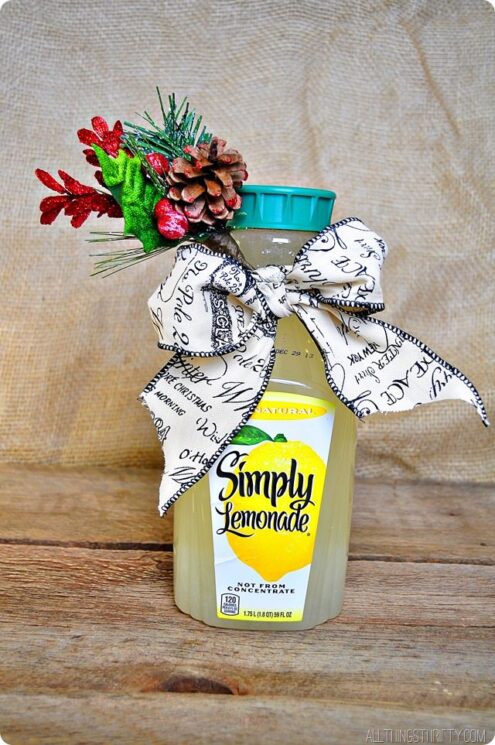 a bottle of lemonade with a bow