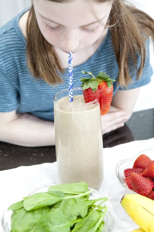 This healthy and satisfying Strawberry Banana Flax Smoothie recipe will keep you going throughout your day with yogurt, fruit, flaxseed, and spinach. www.superhealthykids.com