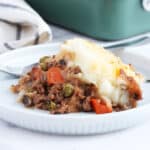 shepherds pie on a plate with a fork